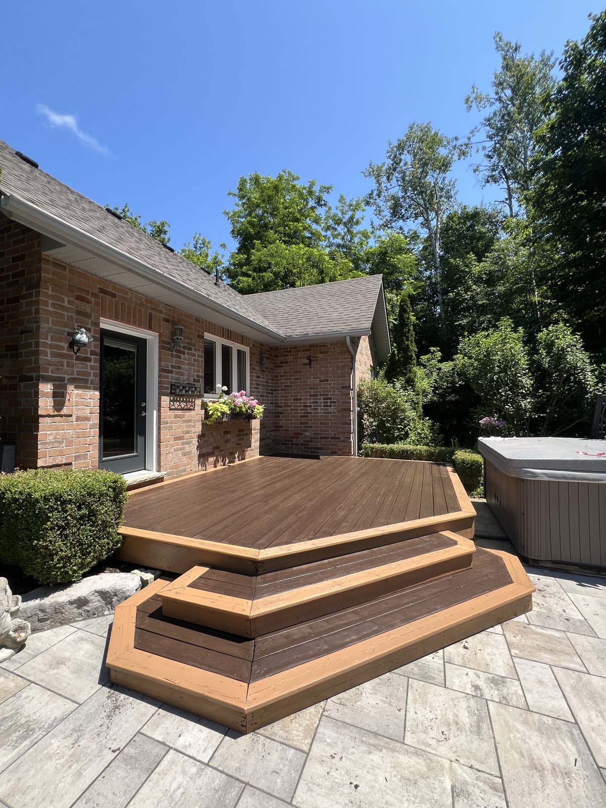 Two-tone multi-level deck and steps, freshly stained