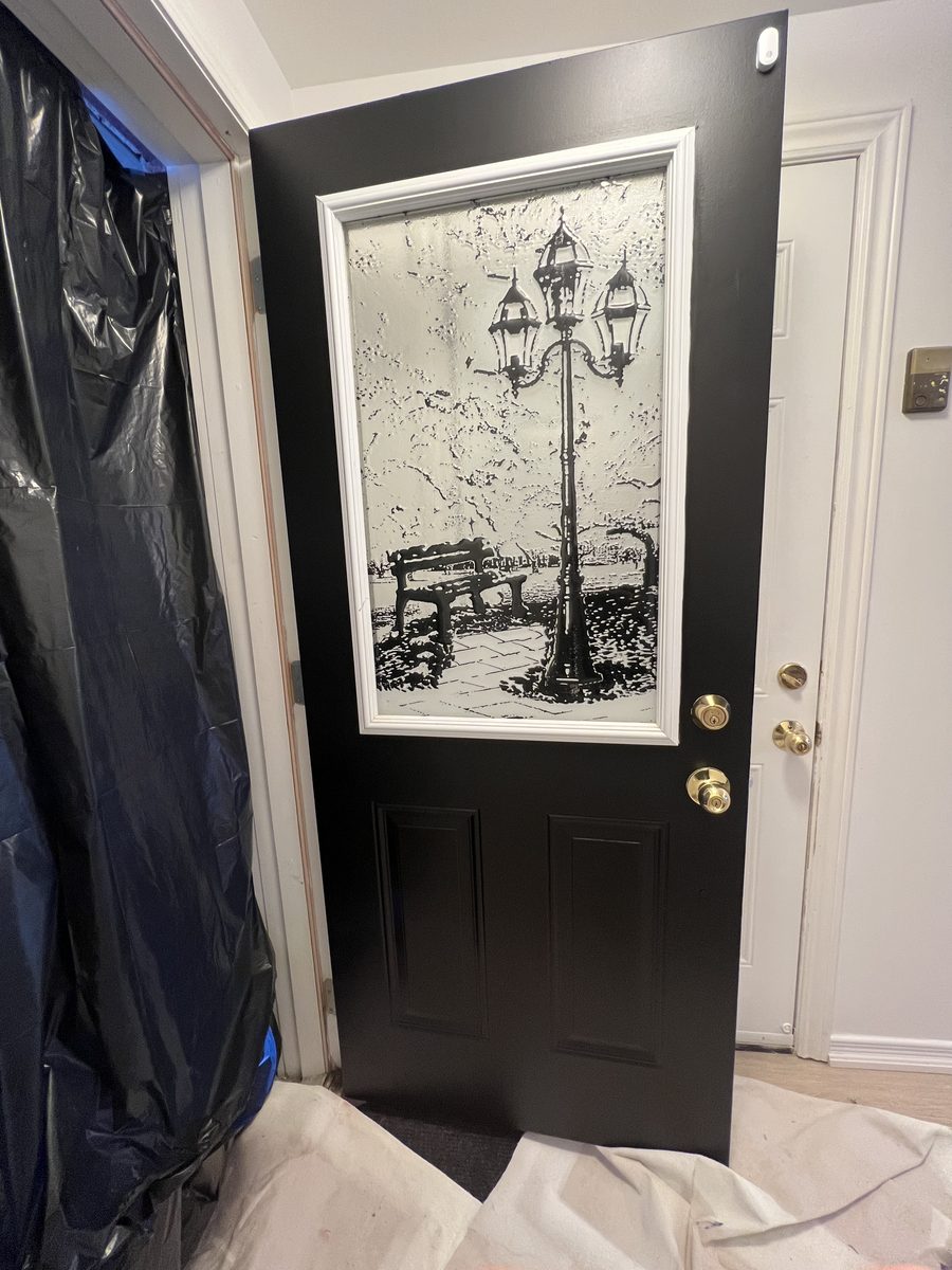 The same door painted black